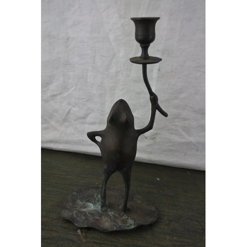 932 - An unusual copper frog candleholder.