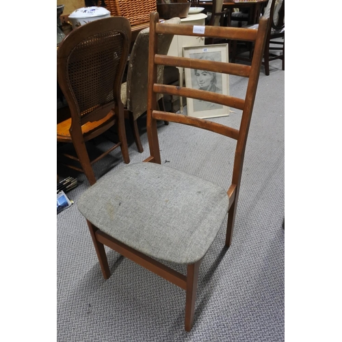 964 - A set of four vintage dining room chairs.