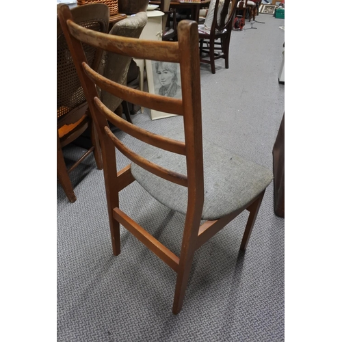 964 - A set of four vintage dining room chairs.