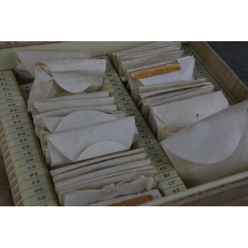 987 - A box of vintage watch glass covers.