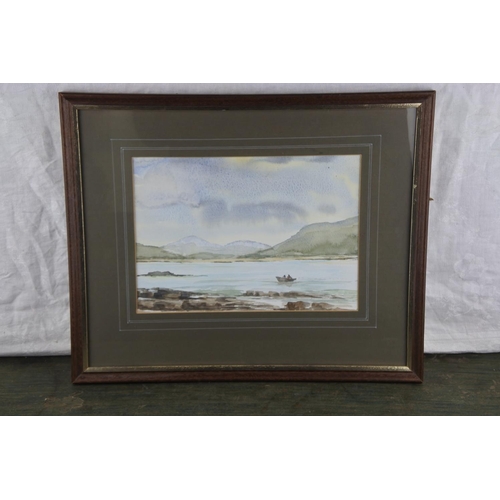 990 - A framed watercolour of a lake scene, measuring 19cm x 28cm.