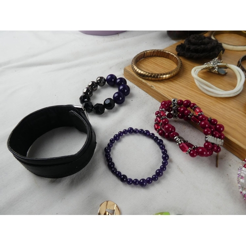 1009 - A large assortment of costume jewellery.