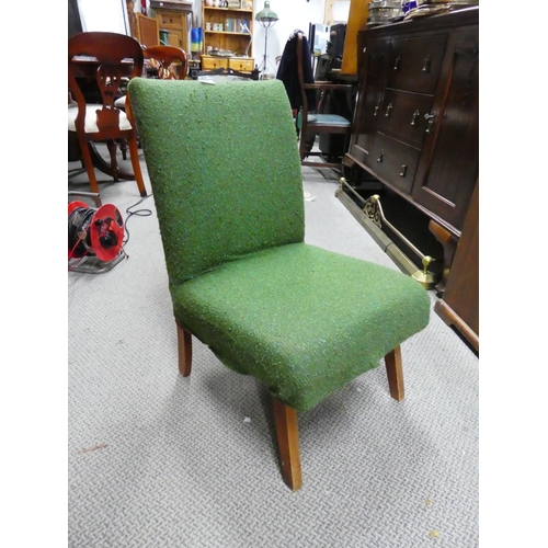 1035 - An upholstered chair.