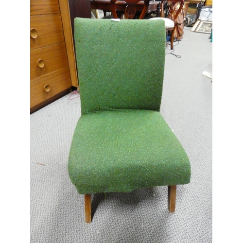 1035 - An upholstered chair.