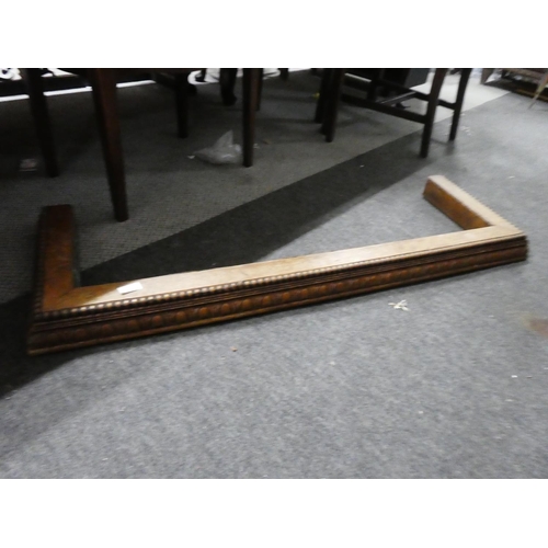 1039 - A carved oak fender, measuring 105cm x 30cm approximately.