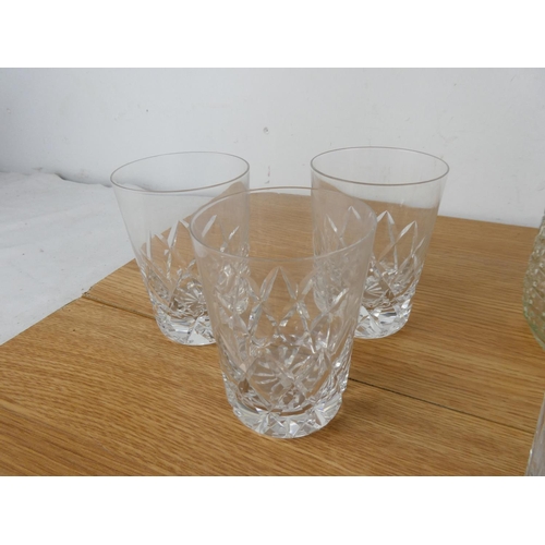 1045 - A glass decanter, a set of three and two Waterford crystal glasses and more.