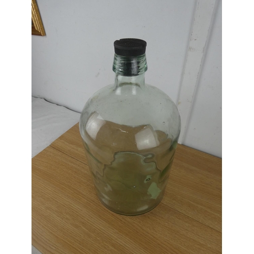 1051 - A large glass lidded bottle.