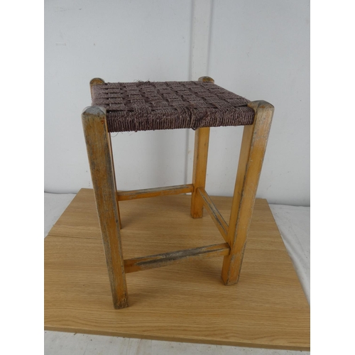 1060 - A pair of vintage rattan topped stools.