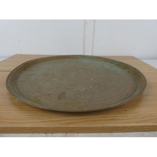 1063 - An antique decorative brass tray.