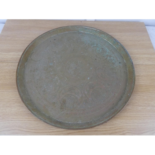 1063 - An antique decorative brass tray.