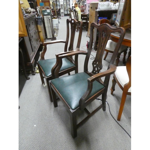 1065 - A pair of antique mahogany armchairs.