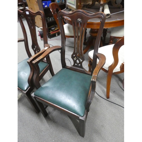 1065 - A pair of antique mahogany armchairs.