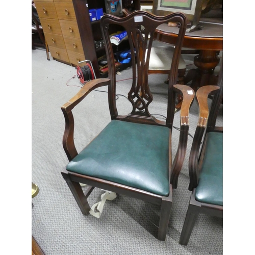 1065 - A pair of antique mahogany armchairs.