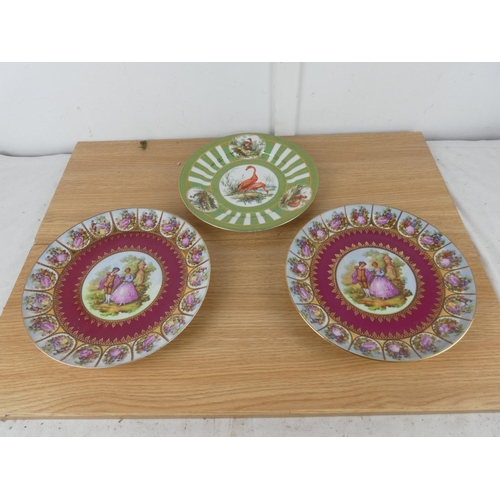 1095 - A pair of Limoges wall plates and another.