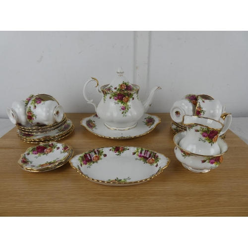 1098 - A Royal Albert Old Country Rose tea set to include teapot, milk jug and sugar bowl and more.