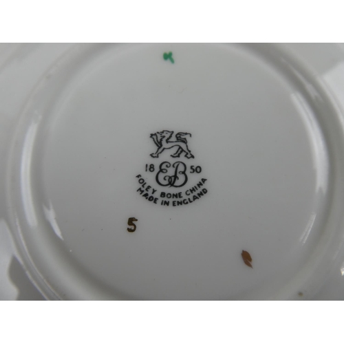 1103 - A Foley bone china cabinet cup, saucer and plate and another by Royal Tara.