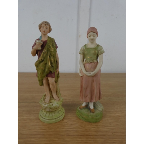 1113 - A pair of Royal Dux figures.