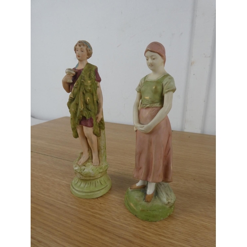 1113 - A pair of Royal Dux figures.