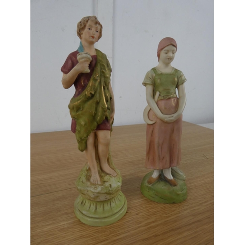 1113 - A pair of Royal Dux figures.