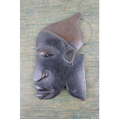 934 - An ebony wooden head plaque.