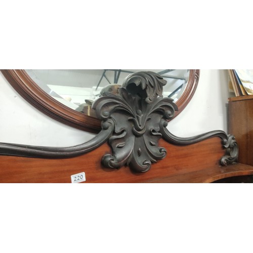 220 - A stunning antique mahogany sideboard with gallery mirror back.