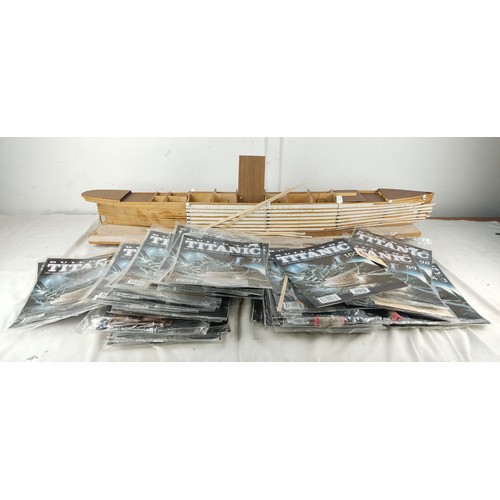 305 - A large set of Build the Titanic magazine kits, along with part built model.