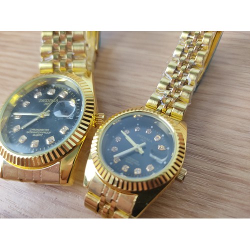 358 - A Dedima ladies and gents wrist watch set.