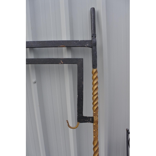 1129 - An antique black and gold painted crane crook.