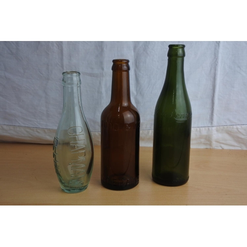 103 - A Hamilton & Todd brown glass beer bottle and two others.