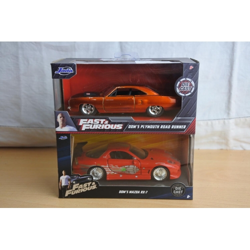 120 - Two boxed Jada 'Fast & Furious' die cast cars - Dom's Plymouth Road Runner and Dom's Mazda RK-7.