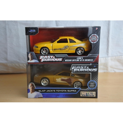 121 - Two boxed Jada 'Fast & Furious' die cast cars - Leon's Nissan Skyline GT-R (BCNR33) and Slap Jack's ... 