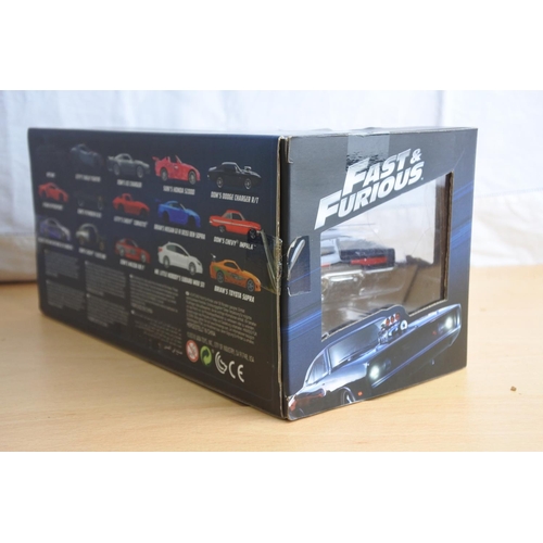 134 - A boxed Jada 'Fast & Furious' die cast car - Dom's Plymouth GTX.