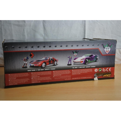 137 - A boxed Jada 'The Joker' die cast car and figure - 2009 Chevy Corvette Stingray.