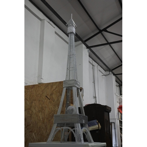 144 - A large model of the Eiffel Tower. Measuring H-160cm