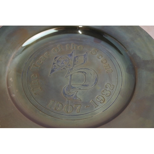 153 - A brass plate 'The Year of the Scouts 1907 - 1982 and two glass paperweights.