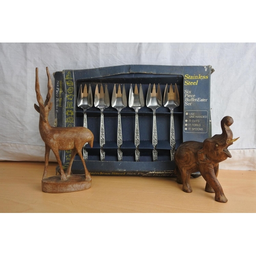 165 - Two vintage wooden animal figures and a boxed set of stainless steel cutlery.