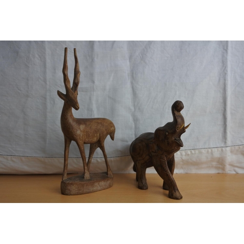 165 - Two vintage wooden animal figures and a boxed set of stainless steel cutlery.