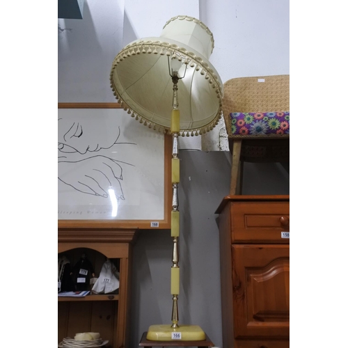 166 - A vintage standard lamp and shade. Measuring H-150cm