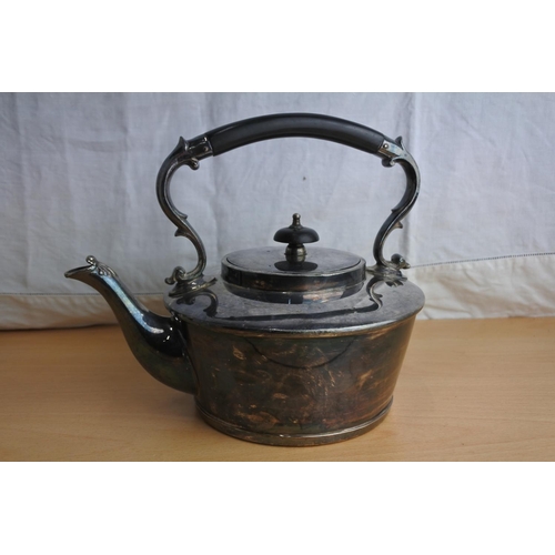 173 - A Walker & Hall silver plated teapot.