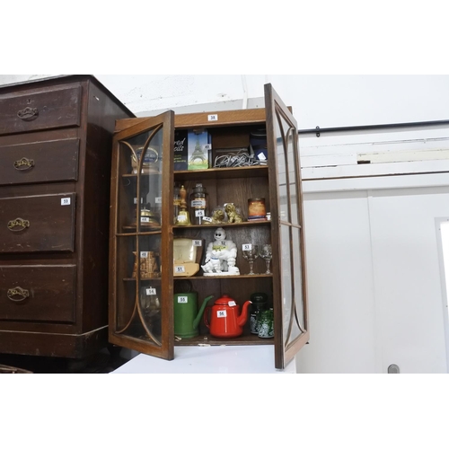 38 - An antique oak two door display cabinet in need of slight restoration. Measuring H-92cm W-74cm D-20c... 