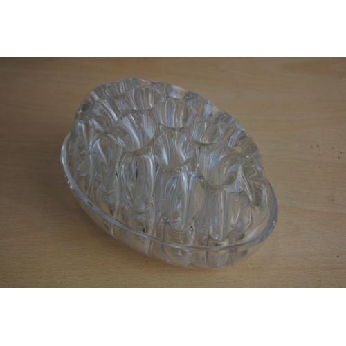 43 - A vintage glass flower holder.