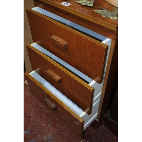 66 - A mid century chest of three drawers.