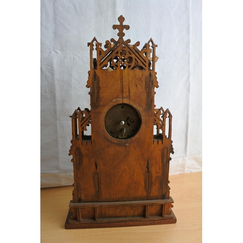 70 - A stunning mahogany carved mantle clock (a/f), measuring 34cm tall.