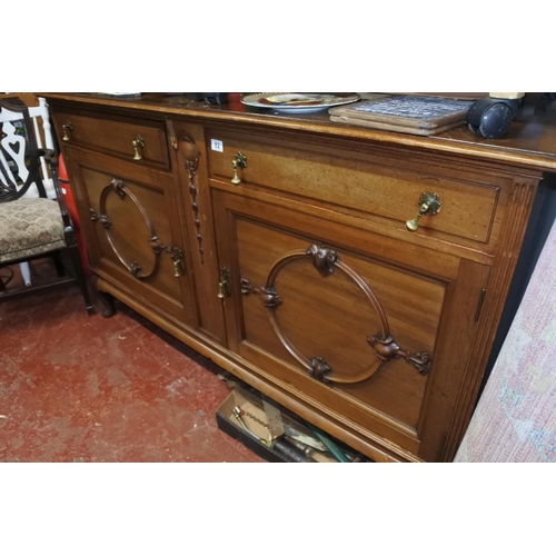 82 - A stunning antique mahogany sideboard with carved detail. Measuring H-100cm W-165cm D-60cm.