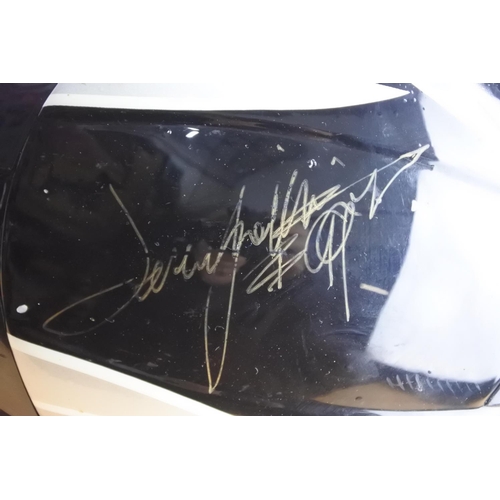 96 - A Nitro motorbike helmet signed by John McGuinness, Steve Plater, Guy Martin, Jeremy McWilliams and ... 