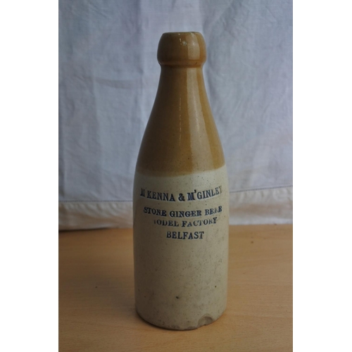 102 - An antique McKenna & McGinley Model Factory - Belfast stoneware beer bottle.