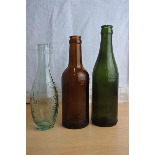 103 - A Hamilton & Todd brown glass beer bottle and two others.