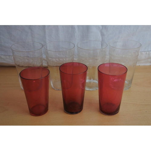 106 - Four antique etched and three ruby glasses.