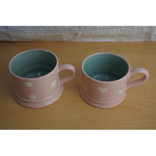 107 - Two Gabriella Miller pink patterned cups.