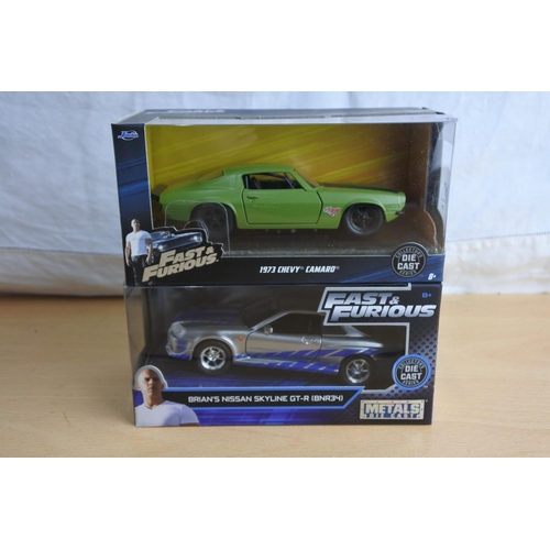 111 - Two boxed Jada 'Fast & Furious' die cast cars - Brian's Nissan Skyline GT-R (BNR34) and 1973 Chevy C... 